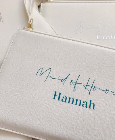 personalised leather look clutch bag with text