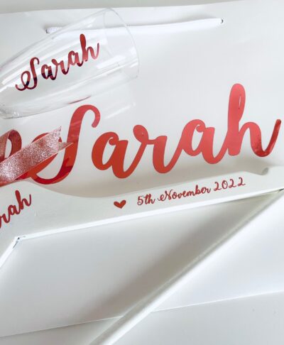 Rose gold bridesmaid hanger, flute and gift bag